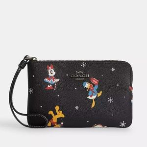 DISNEY X COACH CORNER ZIP WRISTLET WITH HOLIDAY PRINT